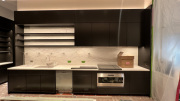 BLACK KITCHEN WITH WHITE STONE