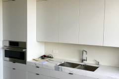 WHITE KITCHEN AT UN PLAZA