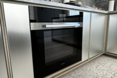 GRAY OAK AND SATIN GLASS FRONT KITCHEN
